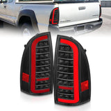 ANZO 05-15 Toyota Tacoma Full LED Tail Lights w/Light Bar Sequential Black Housing Clear Lens ANZO Tail Lights  AXOPROS