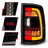 ANZO 09-18 Dodge Ram 1500 Sequential LED Taillights Smoke Black w/Switchback Amber Signal ANZO Tail Lights  AXOPROS