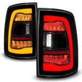 ANZO 09-18 Dodge Ram 1500 Sequential LED Taillights Smoke Black w/Switchback Amber Signal ANZO Tail Lights  AXOPROS