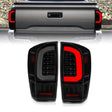 ANZO 16-21 Toyota Tacoma LED Tail Lights - w/ Light Bar Sequential Black Housing & Smoke Lens ANZO Tail Lights  AXOPROS