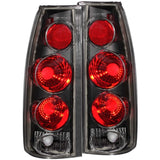 ANZO 1999-2000 Cadillac Escalade Taillights Black 3D Style ANZO Tail Lights  AXOPROS