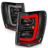 ANZO 1999-2004 Jeep Grand Cherokee LED Tail Lights w/ Light Bar Black Housing Clear Lens ANZO Tail Lights  AXOPROS