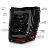 ANZO 1999-2004 Jeep Grand Cherokee LED Tail Lights w/ Light Bar Black Housing Smoke Lens ANZO Tail Lights  AXOPROS