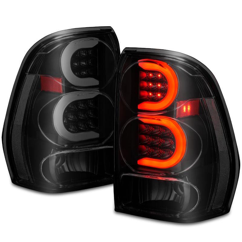 ANZO 2002-2009 Chevrolet Trailblazer LED Tail Lights w/ Light Bar Black Housing Smoke Lens ANZO Tail Lights  AXOPROS