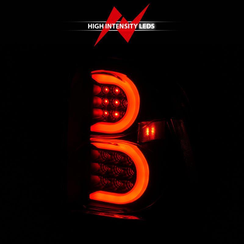 ANZO 2002-2009 Chevrolet Trailblazer LED Tail Lights w/ Light Bar Black Housing Smoke Lens ANZO Tail Lights  AXOPROS