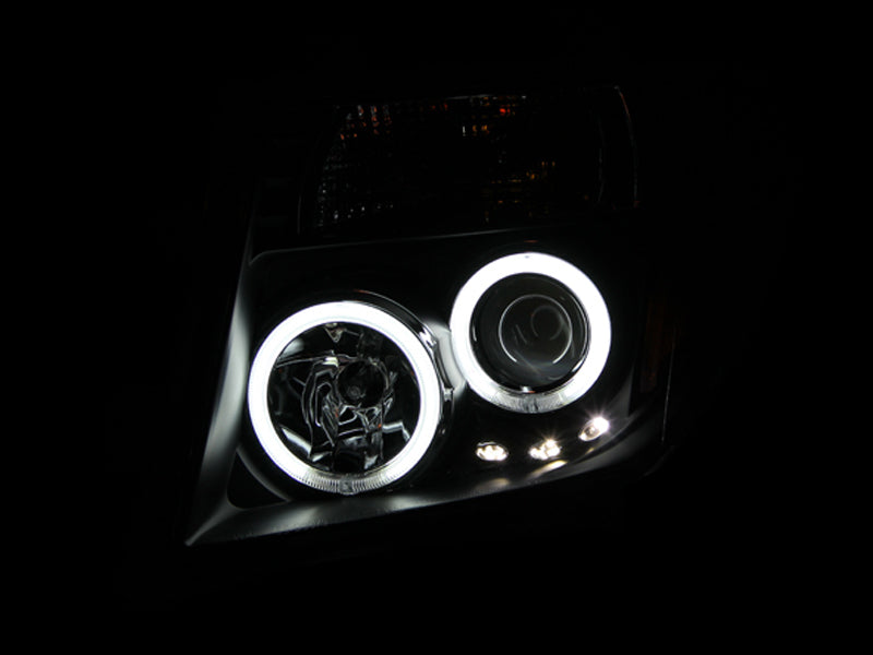 ANZO 2005-2008 Nissan Frontier Projector Headlights w/ Halo Black ANZO Headlights  AXOPROS