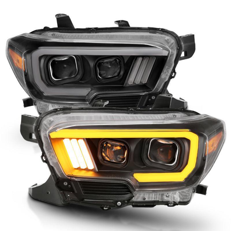 ANZO 2016-2017 Toyota Tacoma Projector Headlights w/ Plank Style Switchback Black w/ Amber ANZO Headlights  AXOPROS