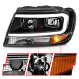 ANZO 99-04 Jeep Grand Cherokee Crystal Headlights - w/ Light Bar Black Housing ANZO Headlights  AXOPROS