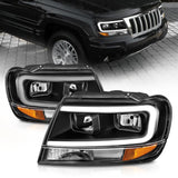 ANZO 99-04 Jeep Grand Cherokee Crystal Headlights - w/ Light Bar Black Housing ANZO Headlights  AXOPROS