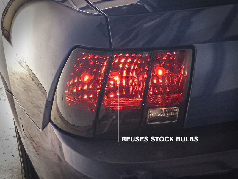 Raxiom 99-04 Ford Mustang Excluding 99-01 Cobra Tail Lights- Black Housing (Smoked Lens) Raxiom Tail Lights  AXOPROS