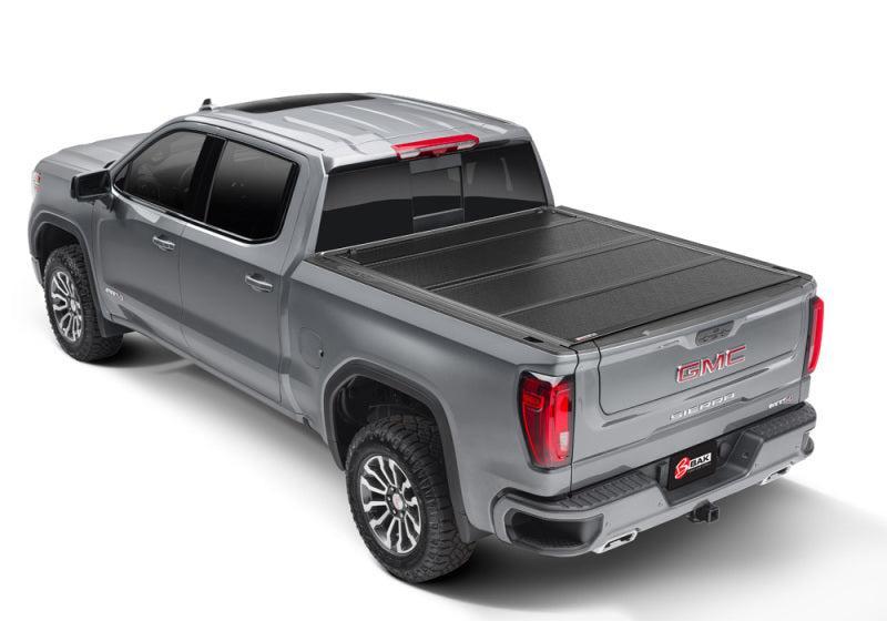 BAK 2020 Chevy Silverado 2500/3500 HD 6ft 9in Bed BAKFlip F1 BAK Tonneau Covers - Hard Fold  AXOPROS