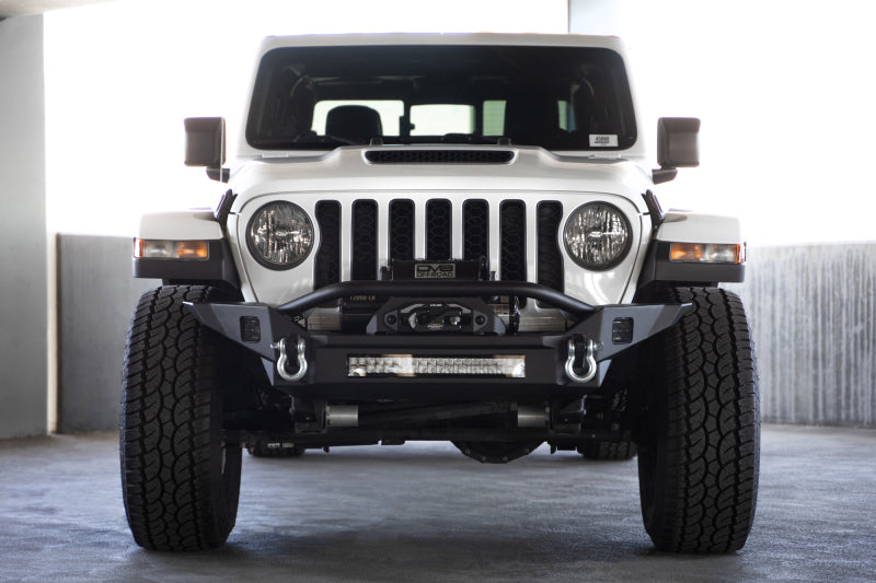 DV8 Offroad 18-23 Jeep Wrangler JL / 20-23 Jeep Gladiator JT FS-7 Mid-Width Winch Front Bumper DV8 Offroad Bumpers - Steel  AXOPROS