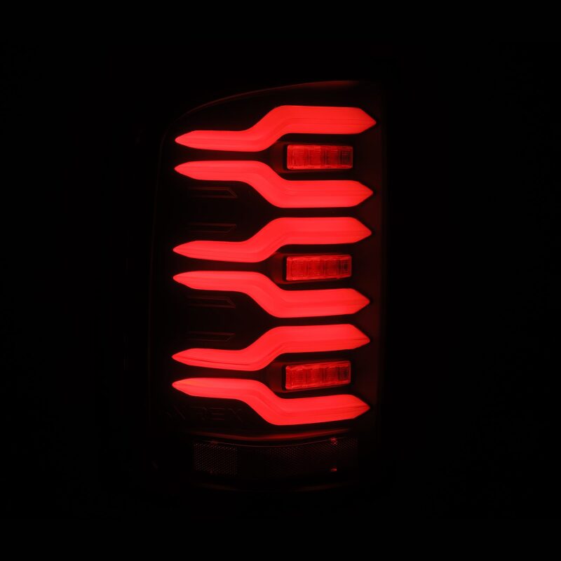 AlphaRex AlphaRex 14-18 GMC Sierra 1500/2500HD/3500HD LUXX-Series LED Tail Lights Blk w/Actv Light & Seq. Sig Tail Lights aftermarket performance part