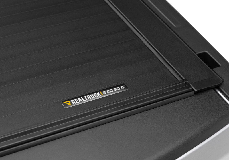 Roll-N-Lock 2019 Ram 1500 XSB 65.5in A-Series Retractable Tonneau Cover Roll-N-Lock Tonneau Covers - Retractable  AXOPROS