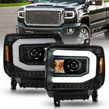ANZO 2014-2015 GMC Sierra 1500 Projector Headlights w/ Light Bar Black Housing (Halogen Type) ANZO Headlights  AXOPROS