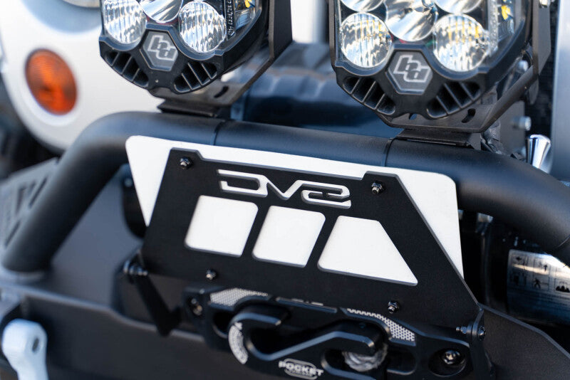 DV8 Offroad Fairlead Mounted Flip-Up License Plate Bracket DV8 Offroad License Plate Relocation  AXOPROS