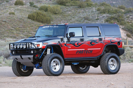 Fabtech 03-08 Hummer H2 Suv/Sut 4WD w/Rr Coil Springs 6in Perf Sys w/Perf Shks Fabtech Lift Kits  AXOPROS