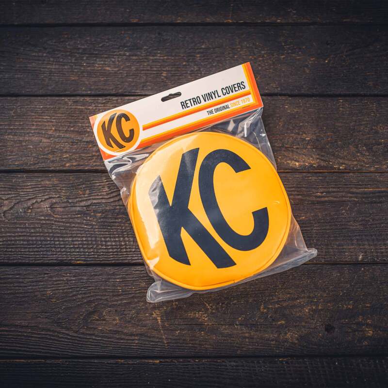 KC HiLiTES Retro 8in Round Yellow Vinyl Light Cover w/ Black KC Logo (Pair) KC HiLiTES Light Covers and Guards  AXOPROS