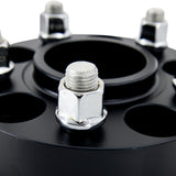 Mishimoto Mishimoto Wheel Spacers 5x114.3 64.1 CB M14x1.5 15mm BK Mishimoto Wheel Spacers & Adapters  AXOPROS