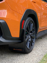 Rally Armor 22-25 Subaru WRX Black UR Mud Flap w/Orange Logo Rally Armor Mud Flaps  AXOPROS
