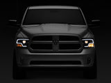 Raxiom 09-18 RAM 1500 LED Halo Projector Headlights- Black Housing (Clear Lens) Raxiom Headlights  AXOPROS