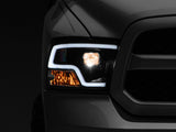 Raxiom 09-18 RAM 1500 LED Halo Projector Headlights- Black Housing (Clear Lens) Raxiom Headlights  AXOPROS