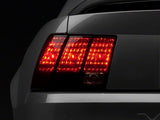 Raxiom 99-04 Ford Mustang Excluding 99-01 Cobra Tail Lights- Black Housing (Smoked Lens) Raxiom Tail Lights  AXOPROS