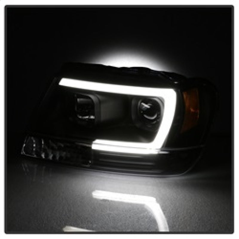Spyder 99-04 Jeep Grand Cherokee Projector Headlights - Light Bar DRL LED - Black SPYDER Headlights  AXOPROS